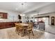 Kitchen dining area with wooden table and chairs at 11047 E Tupelo Ave, Mesa, AZ 85212