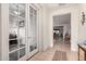 Bright entryway with glass French doors and views into the living room at 11047 E Tupelo Ave, Mesa, AZ 85212