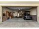 Spacious garage with room for golf cart and ample storage at 11047 E Tupelo Ave, Mesa, AZ 85212