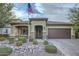 Craftsman style home with two car garage at 11047 E Tupelo Ave, Mesa, AZ 85212