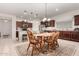 Bright kitchen with an island and a dining area at 11047 E Tupelo Ave, Mesa, AZ 85212