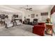 Spacious living room featuring plush seating and open floor plan at 11047 E Tupelo Ave, Mesa, AZ 85212