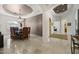 Formal dining room with chandelier and view of entryway at 12067 N 135Th Way, Scottsdale, AZ 85259