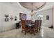 Elegant dining room with chandelier and hardwood floors at 12067 N 135Th Way, Scottsdale, AZ 85259