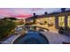 Private pool and spa with a waterfall feature and mountain views at 12067 N 135Th Way, Scottsdale, AZ 85259