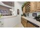 View of a wet bar with wine storage and counter space at 12067 N 135Th Way, Scottsdale, AZ 85259