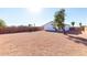 Large backyard with gravel and wooden fence at 1217 S Desert View Pl, Apache Junction, AZ 85120