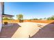 Backyard with gravel, wooden fence, and mountain view at 1217 S Desert View Pl, Apache Junction, AZ 85120