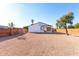 Spacious backyard with gravel and wooden fence at 1217 S Desert View Pl, Apache Junction, AZ 85120