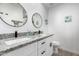 Bathroom with double vanity, granite countertops, and modern fixtures at 1217 S Desert View Pl, Apache Junction, AZ 85120