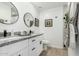 Modern bathroom with double vanity, granite countertop, and a walk-in shower at 1217 S Desert View Pl, Apache Junction, AZ 85120