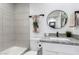 Clean bathroom with granite vanity and neutral tile at 1217 S Desert View Pl, Apache Junction, AZ 85120