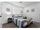 Guest bedroom with a full-size bed and neutral decor at 1217 S Desert View Pl, Apache Junction, AZ 85120