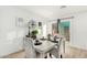 Charming dining area with a rustic table and four chairs at 1217 S Desert View Pl, Apache Junction, AZ 85120