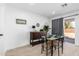 Small dining area with a four-person table and gray curtains at 1217 S Desert View Pl, Apache Junction, AZ 85120