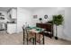 Small dining area with four chairs and a view of the kitchen at 1217 S Desert View Pl, Apache Junction, AZ 85120