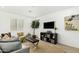 Bright and airy living room with neutral decor and ample natural light at 1217 S Desert View Pl, Apache Junction, AZ 85120