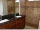 Primary bathroom with granite countertops and shower at 1231 E Helena Dr, Phoenix, AZ 85022