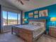 Large bedroom with a king-size bed and scenic window view at 1231 E Helena Dr, Phoenix, AZ 85022