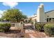 Inviting community patio with seating and Spanish-style architecture at 12947 W Chapala Dr, Sun City West, AZ 85375