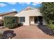 Home exterior view with brick patio and landscaping at 12947 W Chapala Dr, Sun City West, AZ 85375