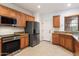 Spacious kitchen featuring stainless steel appliances and granite countertops at 12947 W Chapala Dr, Sun City West, AZ 85375