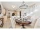 Kitchen with a dining area and a chandelier at 14203 W Rico Dr, Sun City West, AZ 85375