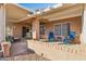 Relaxing patio with covered seating area at 14203 W Rico Dr, Sun City West, AZ 85375