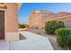 Side yard with a walkway and desert landscaping at 14203 W Rico Dr, Sun City West, AZ 85375