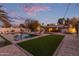 Expansive backyard featuring a refreshing pool and relaxing lounge chairs at 1422 W Colter St, Phoenix, AZ 85013