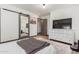 Spacious bedroom with a large mirror and modern dresser at 1422 W Colter St, Phoenix, AZ 85013