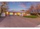 Mid-century modern home with updated garage and landscaping at 1422 W Colter St, Phoenix, AZ 85013