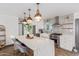 Modern kitchen with white cabinets and patterned backsplash at 1422 W Colter St, Phoenix, AZ 85013