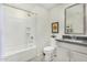 Clean bathroom with a bathtub, toilet, and modern vanity at 155 N Lakeview Blvd # 100, Chandler, AZ 85225