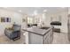 Modern kitchen with island and open living area view at 155 N Lakeview Blvd # 100, Chandler, AZ 85225