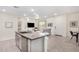 Modern kitchen island with sink and breakfast bar at 155 N Lakeview Blvd # 100, Chandler, AZ 85225