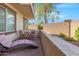 Private patio with seating and view of a block wall at 155 N Lakeview Blvd # 100, Chandler, AZ 85225