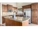 Kitchen with granite countertops and wood cabinets at 16146 E Gleneagle Dr, Fountain Hills, AZ 85268