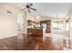 Kitchen with an island, stainless steel appliances, and hardwood floors at 16146 E Gleneagle Dr, Fountain Hills, AZ 85268