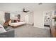 Spacious main bedroom with ensuite bathroom and ample closet space at 1624 W Lawrence Rd, Phoenix, AZ 85015