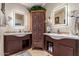 Double vanity bathroom with decorative mirrors at 16813 S 37Th Way, Phoenix, AZ 85048