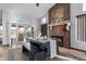 Farmhouse-style dining area with fireplace and access to backyard at 16813 S 37Th Way, Phoenix, AZ 85048