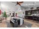 Open dining area with farmhouse table and view to living room and kitchen at 16813 S 37Th Way, Phoenix, AZ 85048