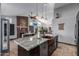 Gourmet kitchen island with copper sink, granite countertops and high-end appliances at 16813 S 37Th Way, Phoenix, AZ 85048