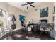 Home office with desk, chairs, and ample natural light at 16813 S 37Th Way, Phoenix, AZ 85048