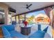 Covered patio with seating area, fire pit, and view of the pool at 16813 S 37Th Way, Phoenix, AZ 85048