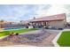 Relaxing pool area with artificial turf and rock features at 16813 S 37Th Way, Phoenix, AZ 85048