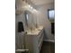 Bathroom features double vanity, updated fixtures and large mirrors at 1707 E Mclellan Blvd, Phoenix, AZ 85016