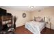 Bright bedroom with wood floors and built-in shelving at 1707 E Mclellan Blvd, Phoenix, AZ 85016