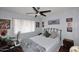 Bright bedroom with a desk area and ceiling fan at 1707 E Mclellan Blvd, Phoenix, AZ 85016